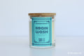 Moodcraft candle labeled 'Brain Wash' on a light blue background