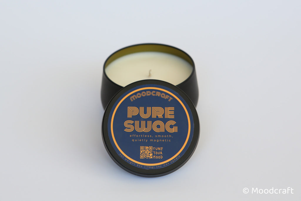 Moodcraft candle with 'Pure Swag' label on a white background